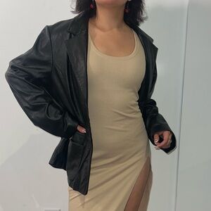 Black Leather Jacket and Beige Dress
